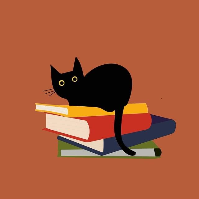 cat on books