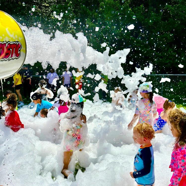 Kids playing in foam